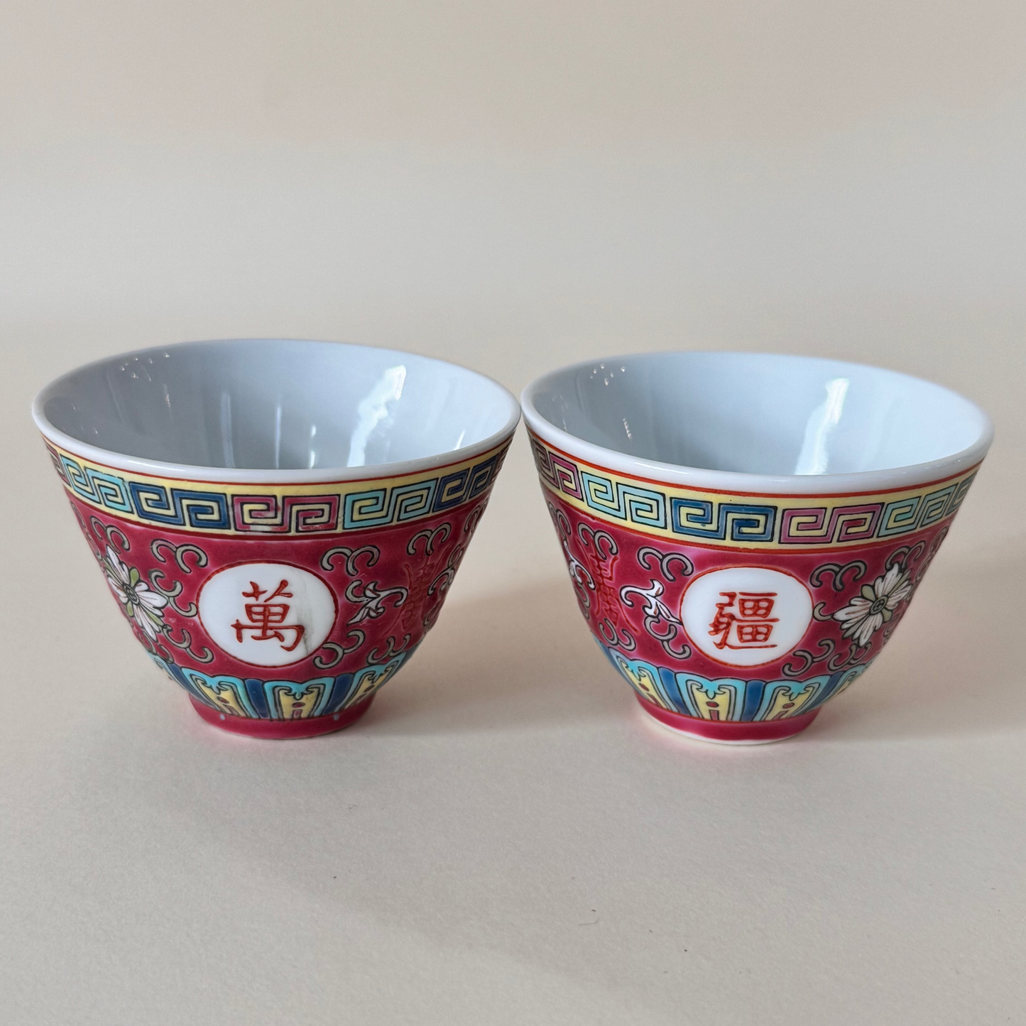 Pair of Vintage Wan Shou Wu Jiang Red Longevity Teacups