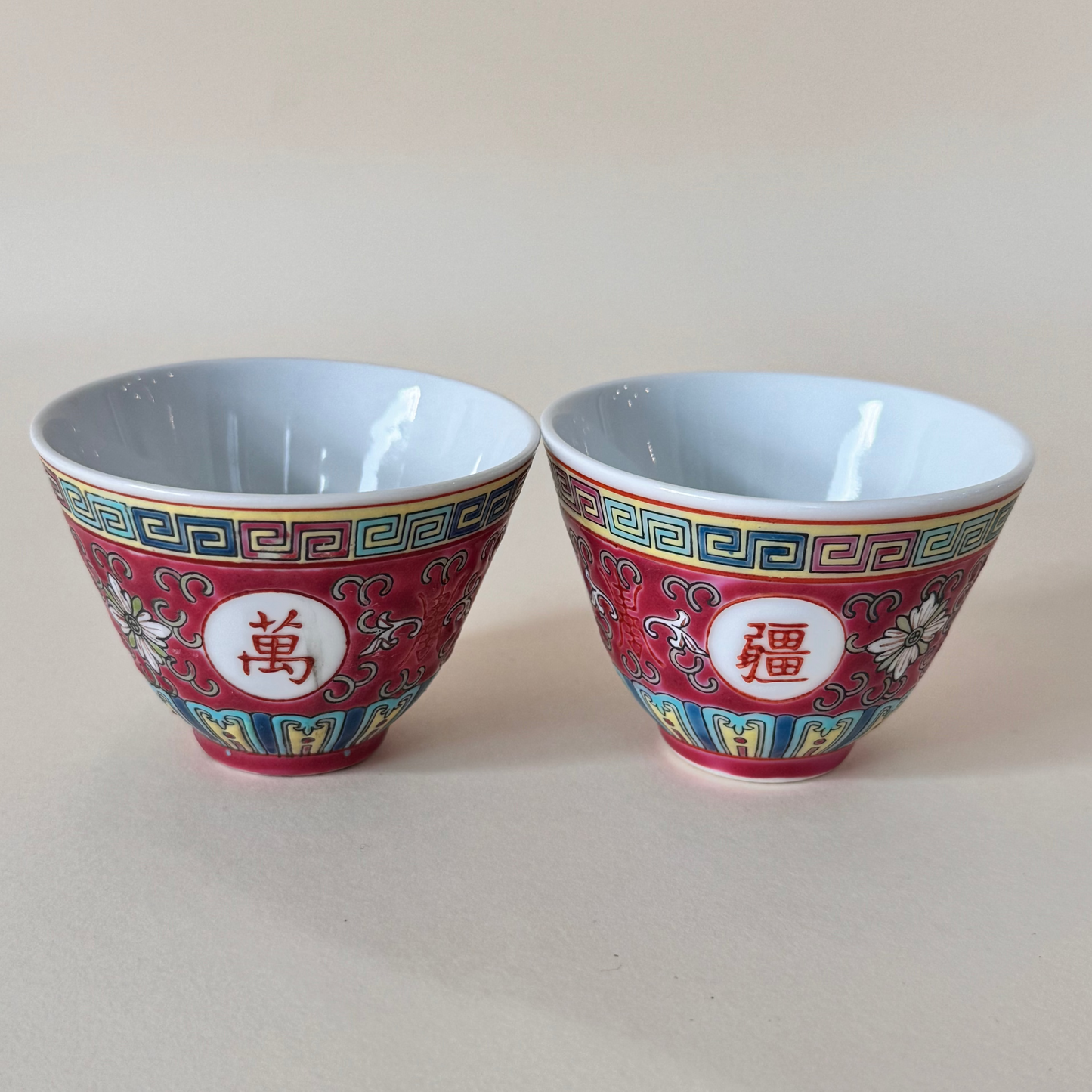 Pair of Vintage Wan Shou Wu Jiang Red Longevity Teacups